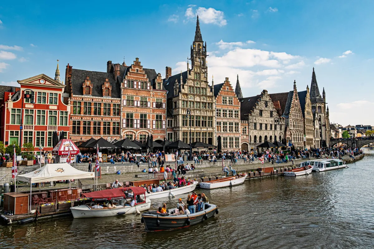 Historic Graslei buildings along the water in Ghent