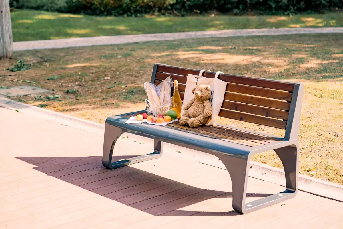 Groceries and bread arranged for an outdoor picnic