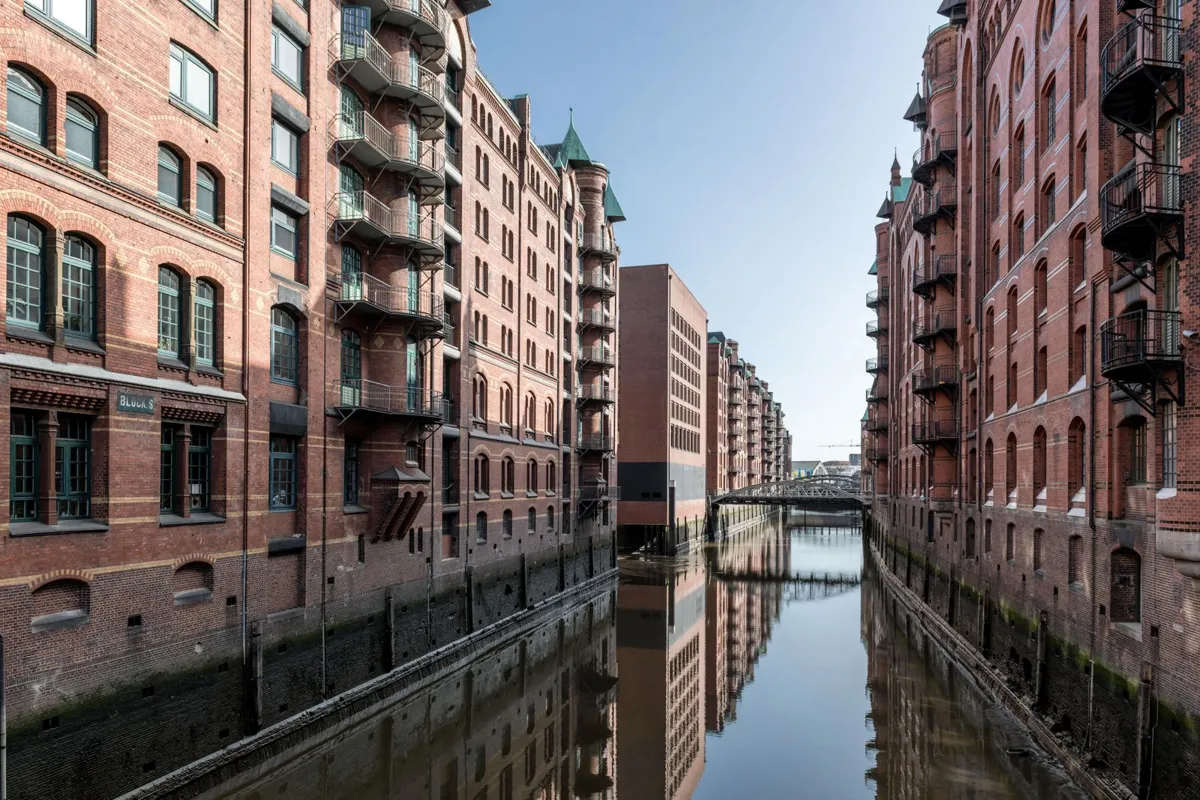 Hamburg warehouse buildings reflected in a canal
