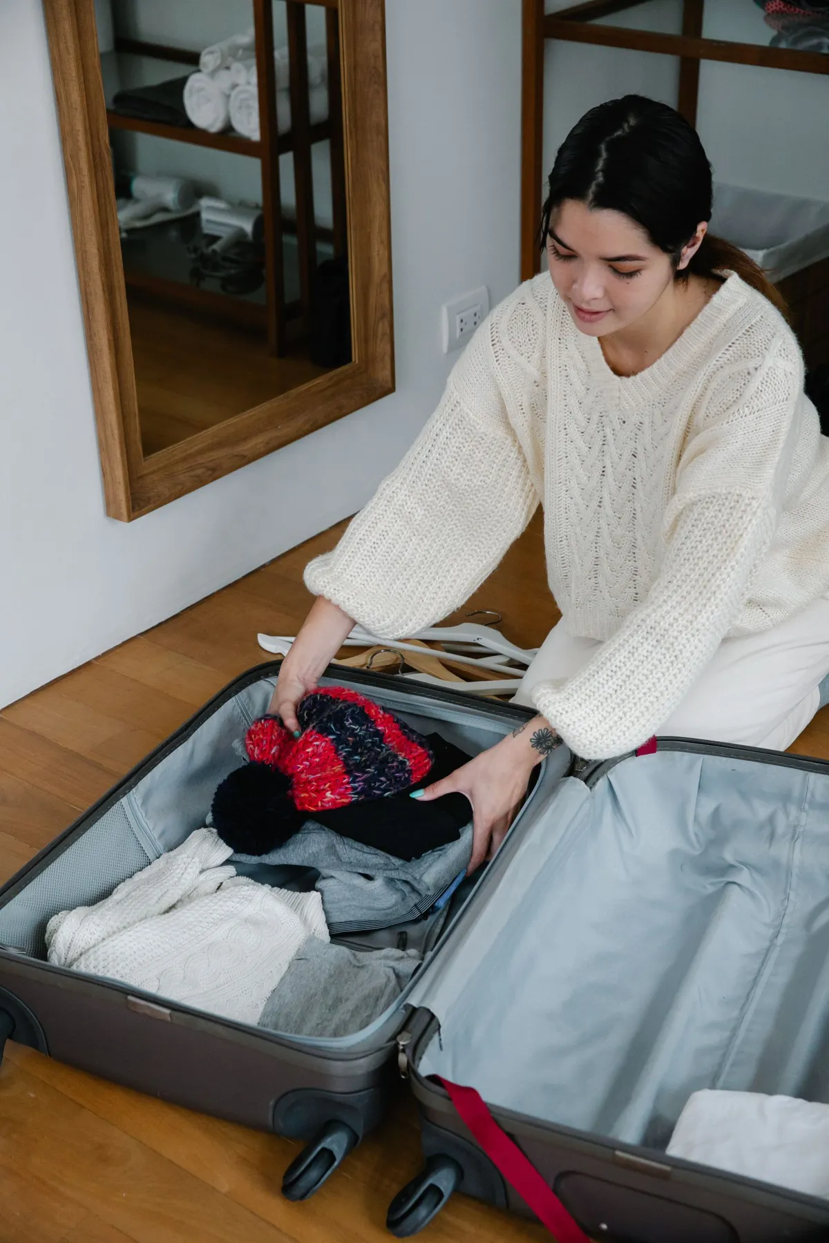 Clothes and knitwear being arranged for packing