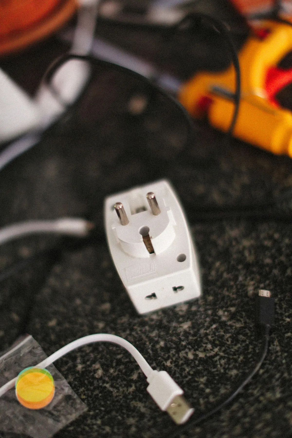 Universal plug adapter with charging cables