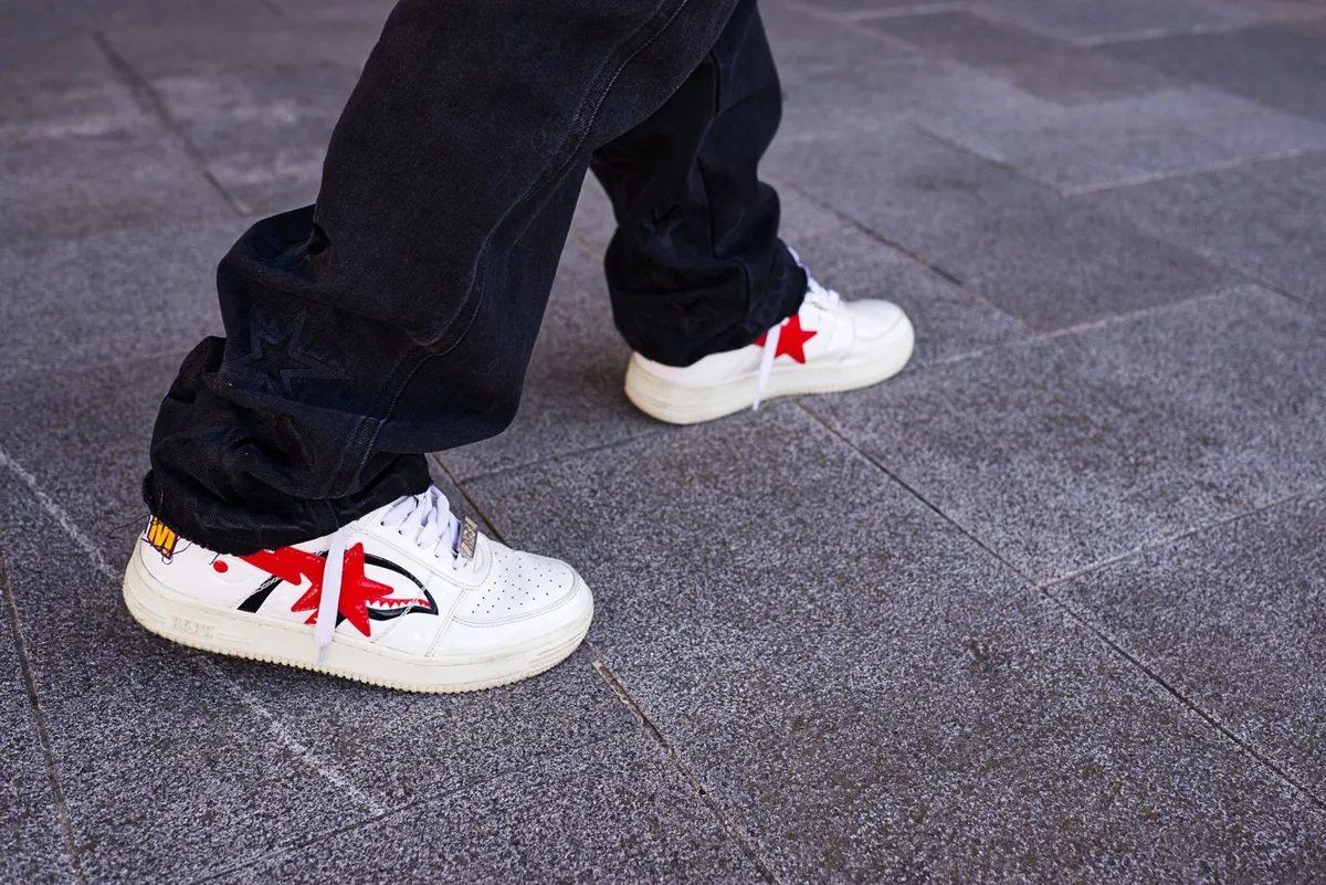 Comfortable sneakers walking on city pavement